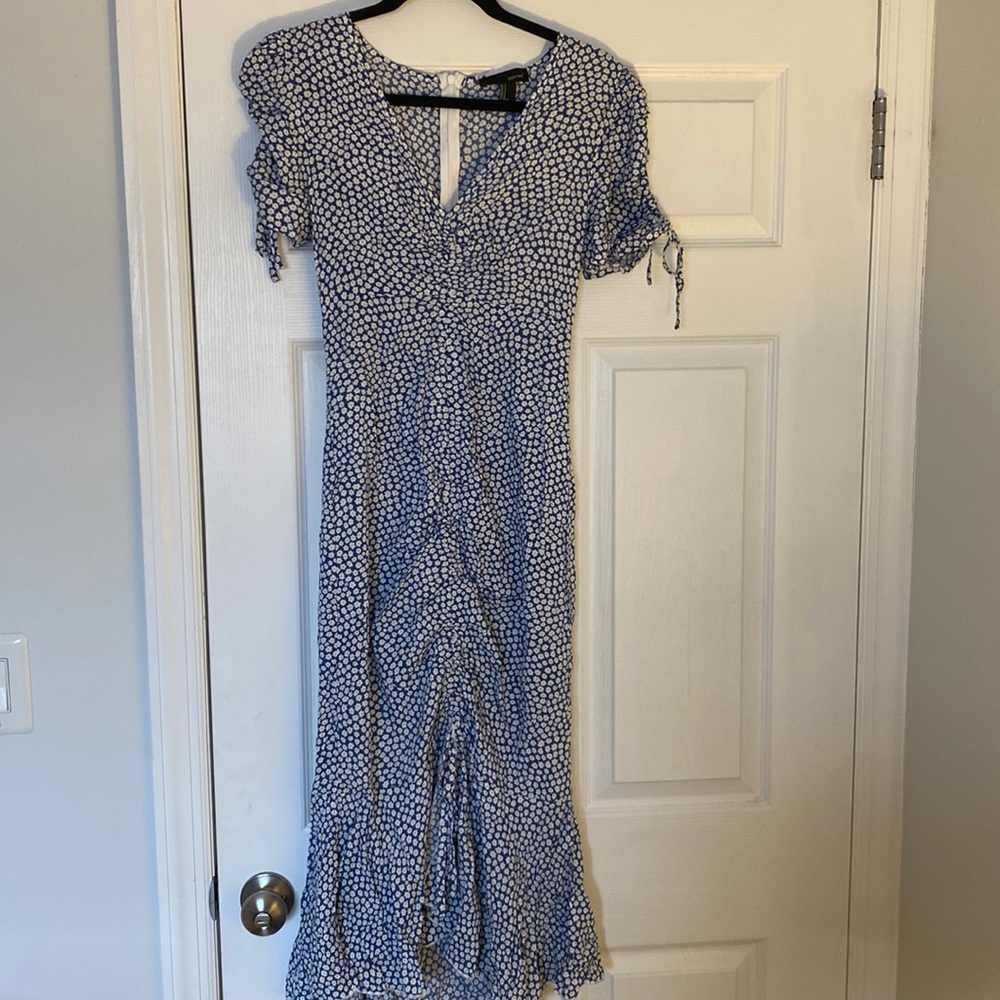 Blue ditsy floral mermaid hem dress in Size Small.